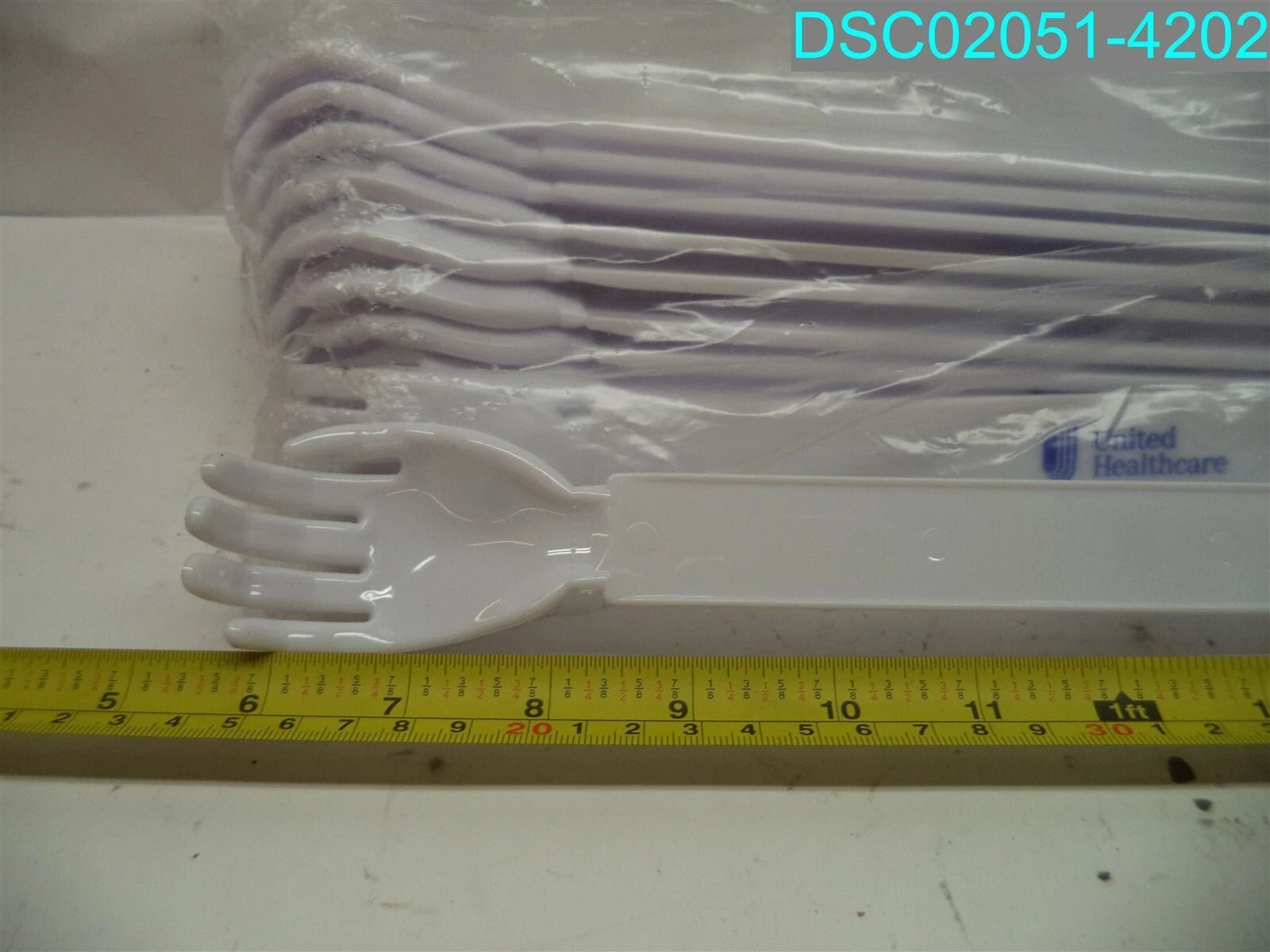 QTY=19: White United Healthcare Shoe Horn & Back Scratcher